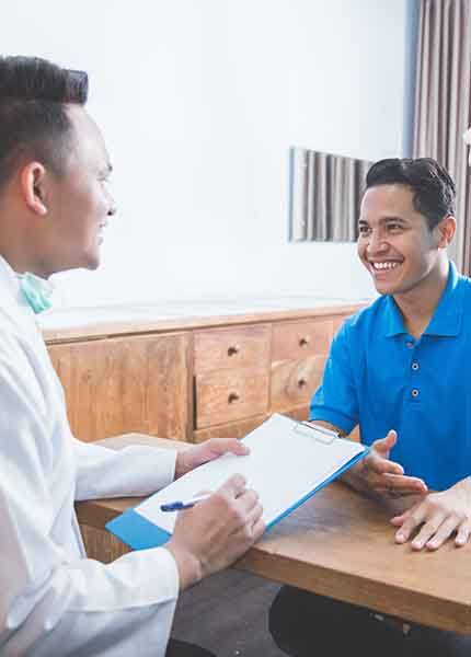 patient talking to doctor about treatment 