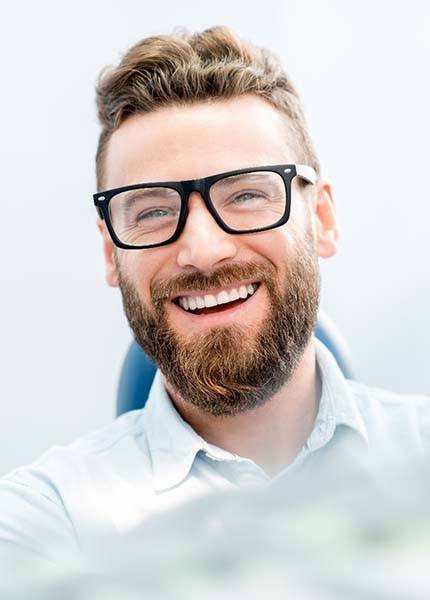 Man at dentist for a dental crown