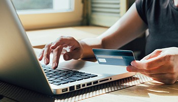 Woman using a credit card