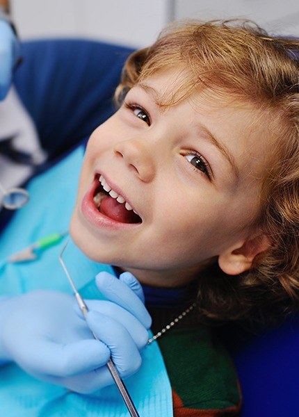 Little boy smiling during children's dentistry visit